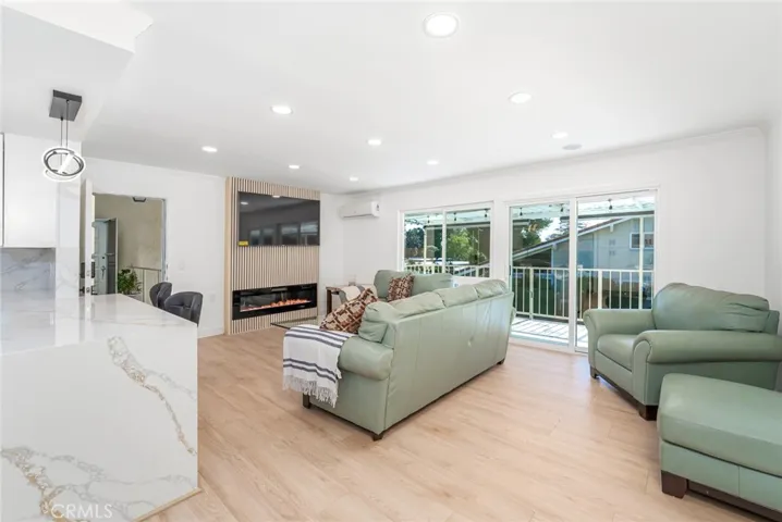 70" TV Included with an electric fireplace for some ambiance!