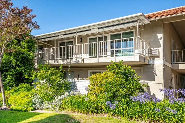 Balcony features a tile flooring and remote control shades