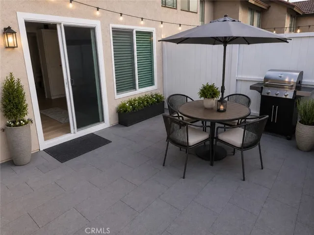 Patio - AI Virtually Staged Photo. Furniture, décor, furnishings, and/or accessories have been digitally added for illustrative purposes and are not included with the property.