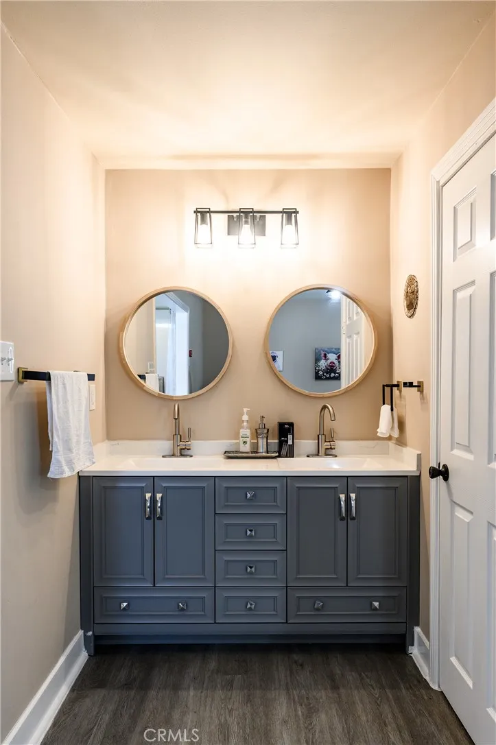 1955 master bath dual vanity, separate shower & toilet room on the right.