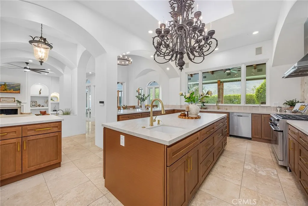 kitchen has 2 sinks and a Dacor commercial oven