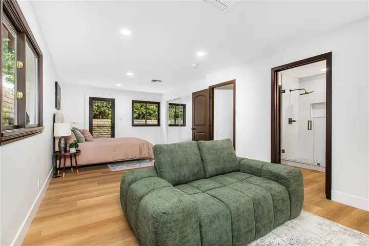 casita opens to the circular driveway, has garage access, has 2 master suites each with their own entrance, laundry facilities, and kitchen/kitchenette.  This photo is a master suite.