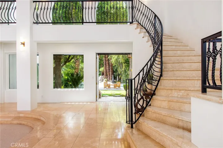 stairs to 2nd primary with on suite, bar and balcony