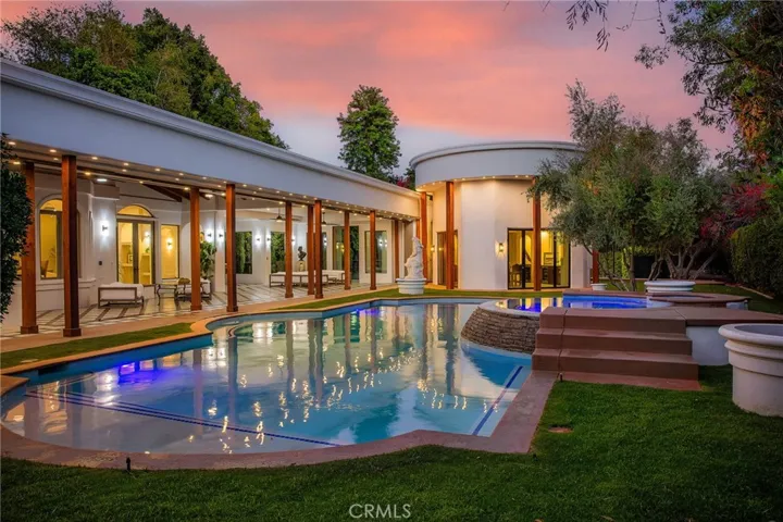 rotunda is between the pool and tennis court- it has 3 seperate accordian doors, a kitchenette, 4 TVs, 3 wine fridges