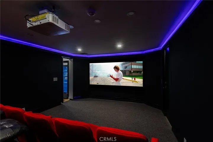 lower level also has a theater that will shake every wall of the house and vibrate your liver so much that you surrendern and turn it down.