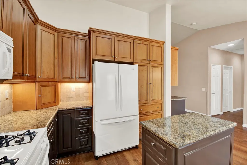 Custom Kitchen Cabinets with a Bread Box and Large Pantry