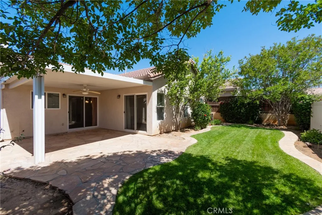 Direct Access from the Kitchen or the Primary Bedroom to your Beautifully Landscaped Backyard