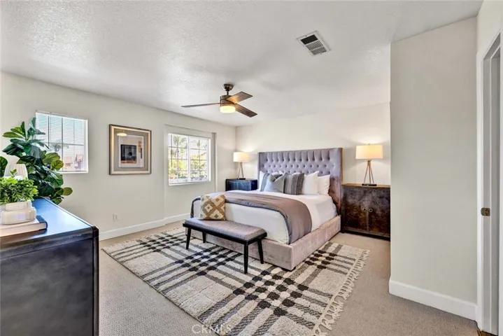 Upstairs Main bedroom with remote ceiling fan