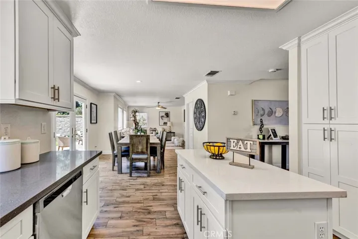Kitchen followed by dining area and family room