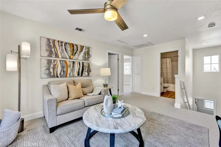 Loft with remote ceiling fan