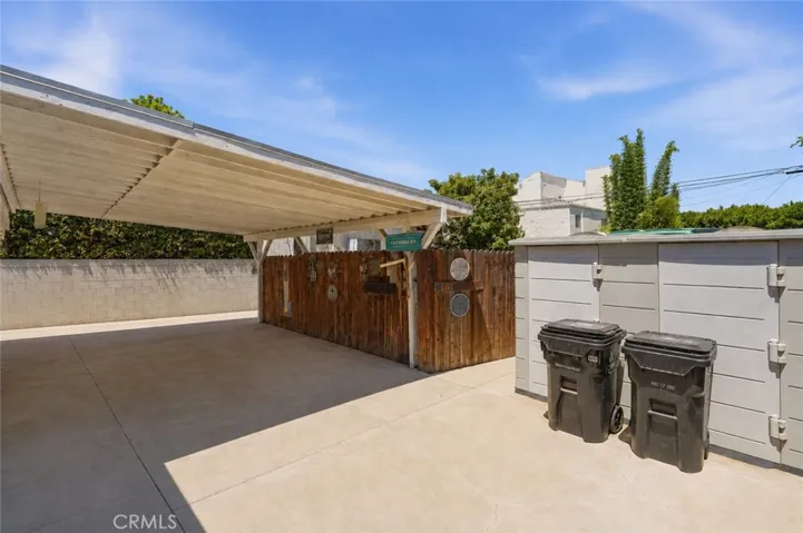 Alternate view of the covered patio area.  Private backyard patio, perfect for outdoor dining or relaxing. 
( Photo has been virtually edited to remove personal  property that will not be present at the close of escrow. )