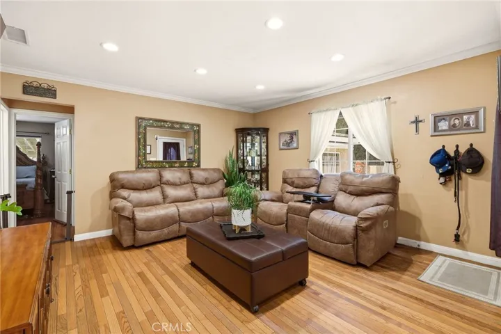 Enjoy another perspective of the warm and inviting living room.