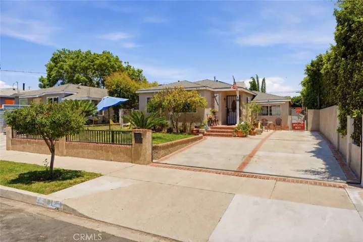 Large, gated driveway that fits 3 vehicles.