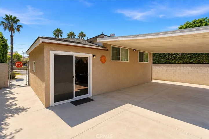 Private backyard patio, perfect for outdoor dining or relaxing. ( Photo has been virtually edited to remove personal  property that will not be present at the close of escrow. )