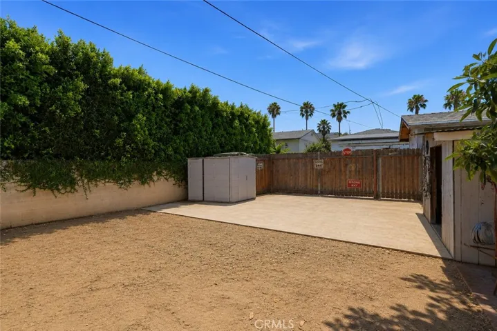 Expansive backyard with ADU potential (buyer to verify), offering endless possibilities for entertaining, outdoor living, hobbies, or future expansion.  
( Photo has been virtually edited to remove personal  property that will not be present at the close of escrow. )