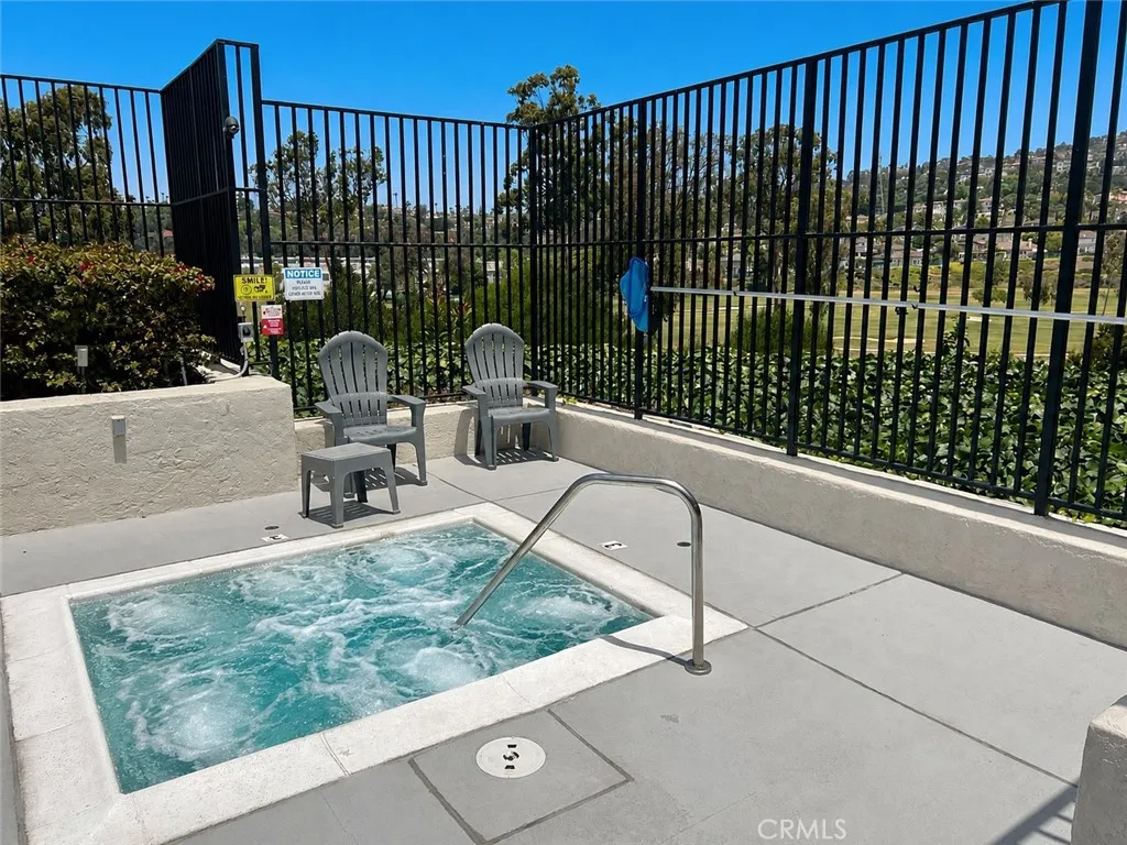 Jacuzzi. AI enhance blue sky, water and jets.