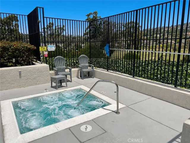 Jacuzzi. AI enhance blue sky, water and jets.
