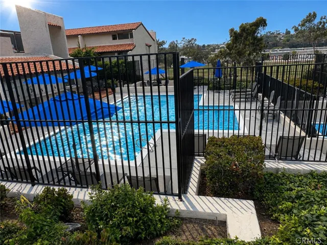 Distant view of pool. AI enhanced blue sky.