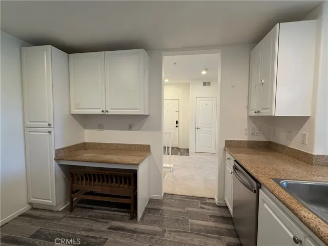 Cabinets and sitting area in Kitchen