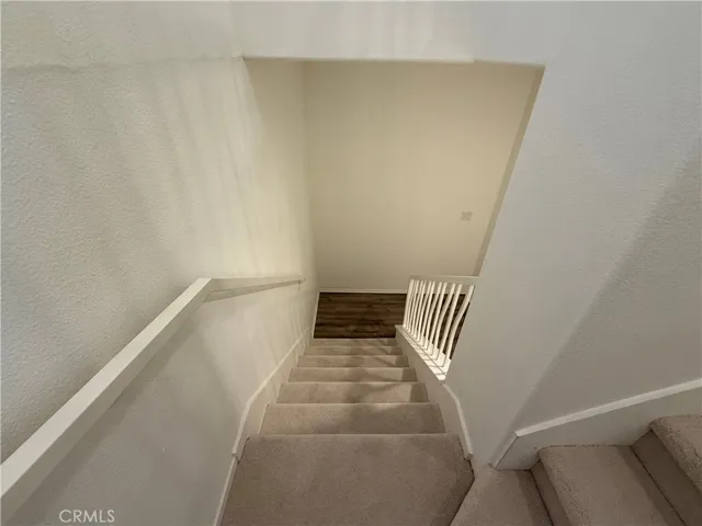 Steps going down to the 2 bedrooms