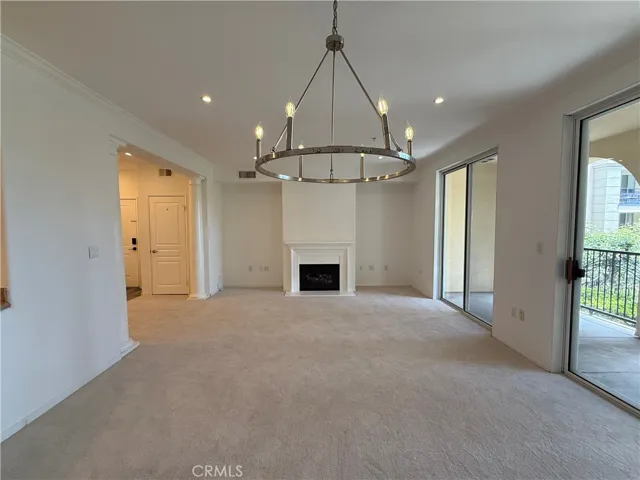 Chandelier in front of the kitchen countertop