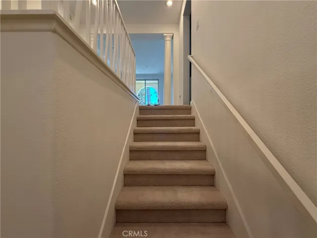 Stairs leading up to the Kitchen and Living room