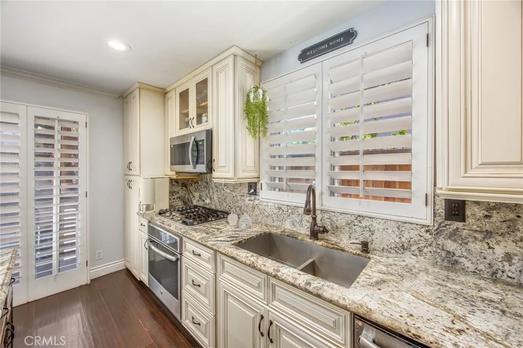Custom cabinetry and generous counter space create a highly functional kitchen workspace