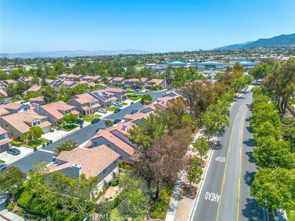 Located in a well-maintained neighborhood with tree-lined streets and nearby community amenities