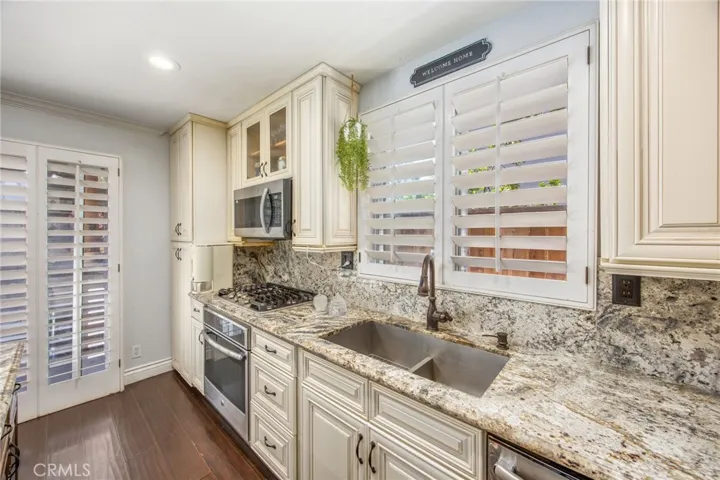 Custom cabinetry and generous counter space create a highly functional kitchen workspace