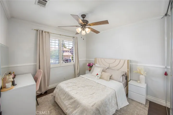 Well-sized bedroom with a comfortable layout and natural light