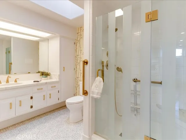 Full view of main upgraded bathroom with a lot of storage