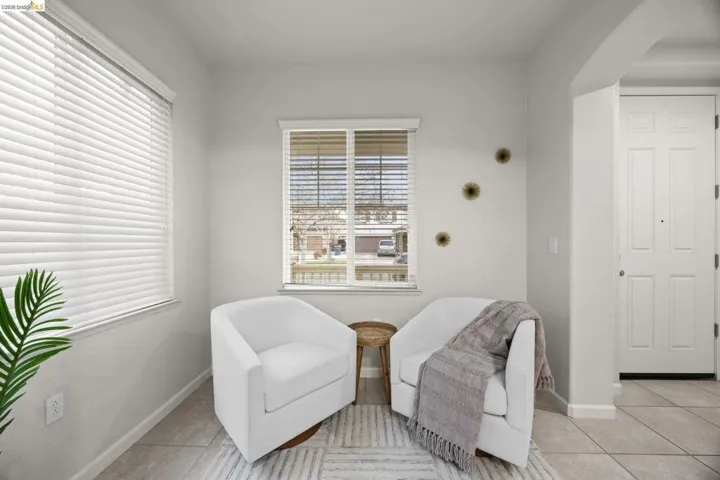 flex room/sitting room, can be used as office, play area, or additional bonus space downstairs.