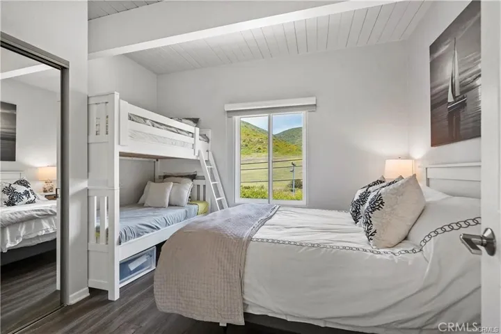 Second Bedroom with queen size bed and bunkbeds