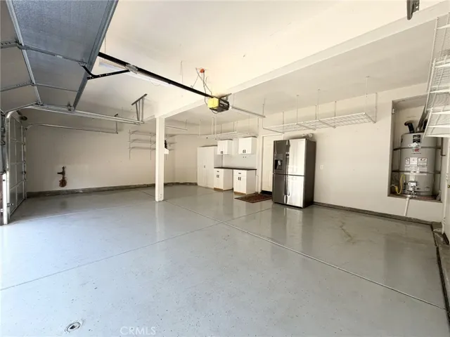 3-Car Garage with Epoxy Flooring & Cabinets