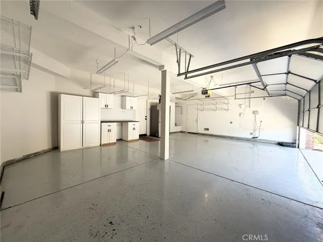 3-Car Garage with Epoxy Flooring & Cabinets