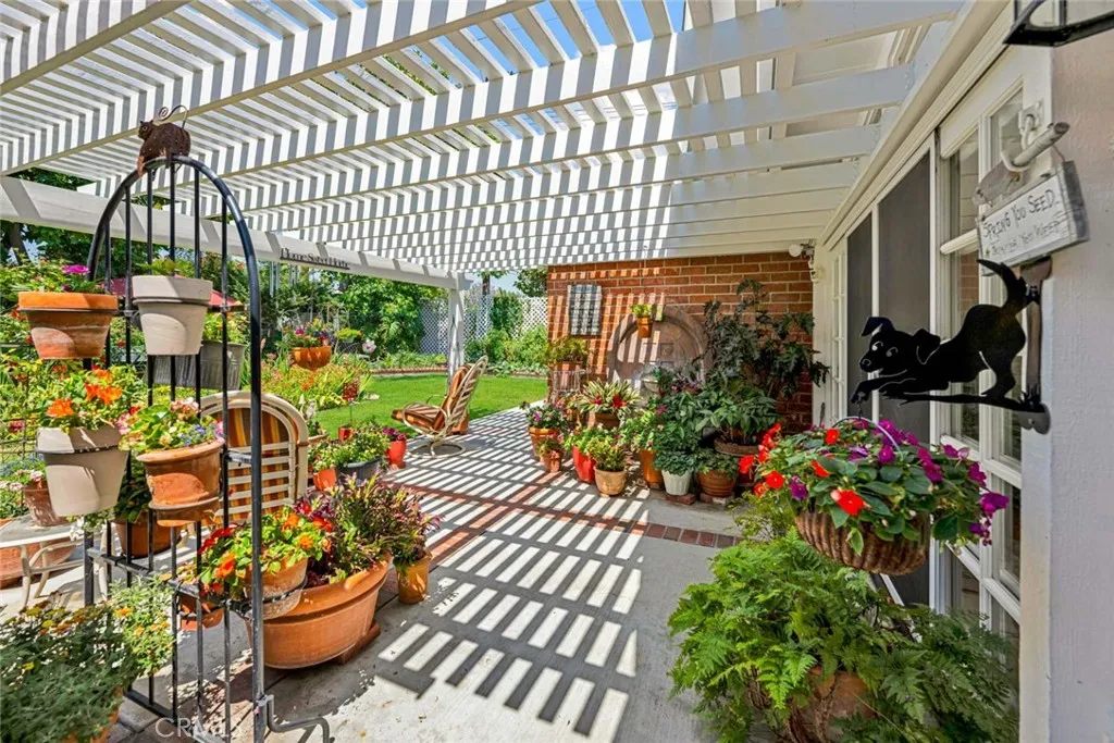 ANOTHER VIEW OF THE COVERED PATIO AREA IN THE BACKYARD