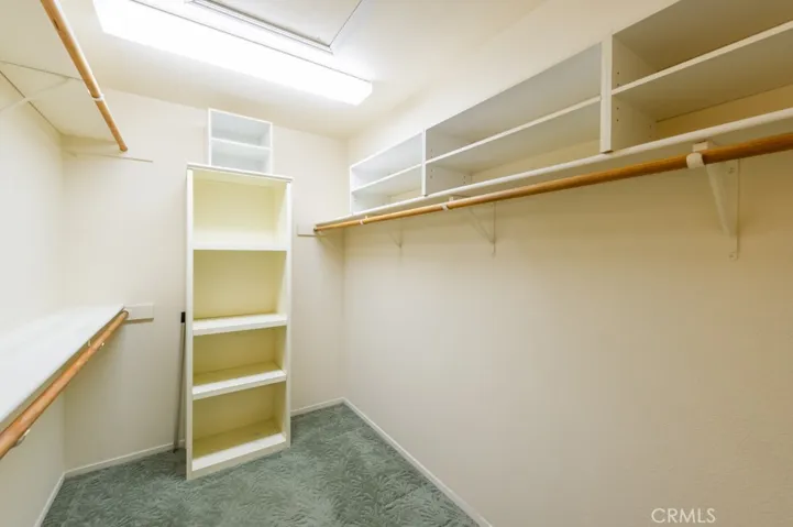 Primary Walk-In Closet w/Pull Down Attic Entry