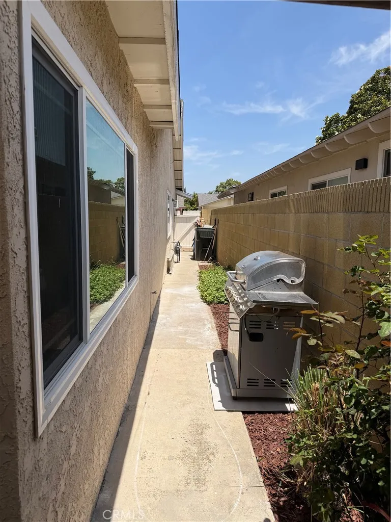 East side of house with access to front of the house.