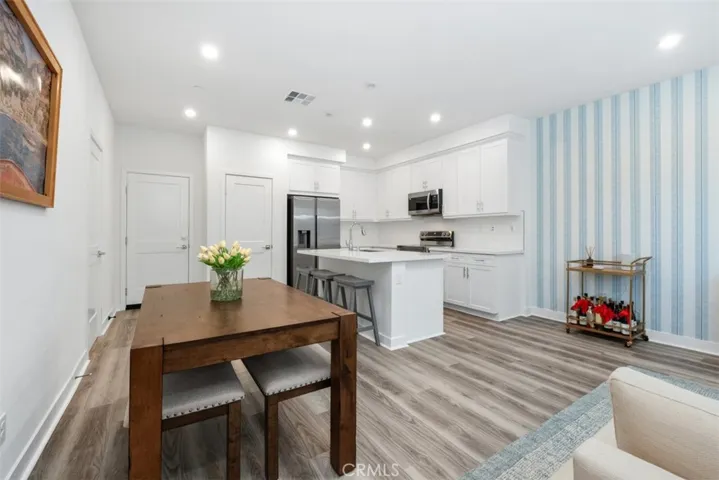 Designer Wallpaper with Luxury Plank Flooring