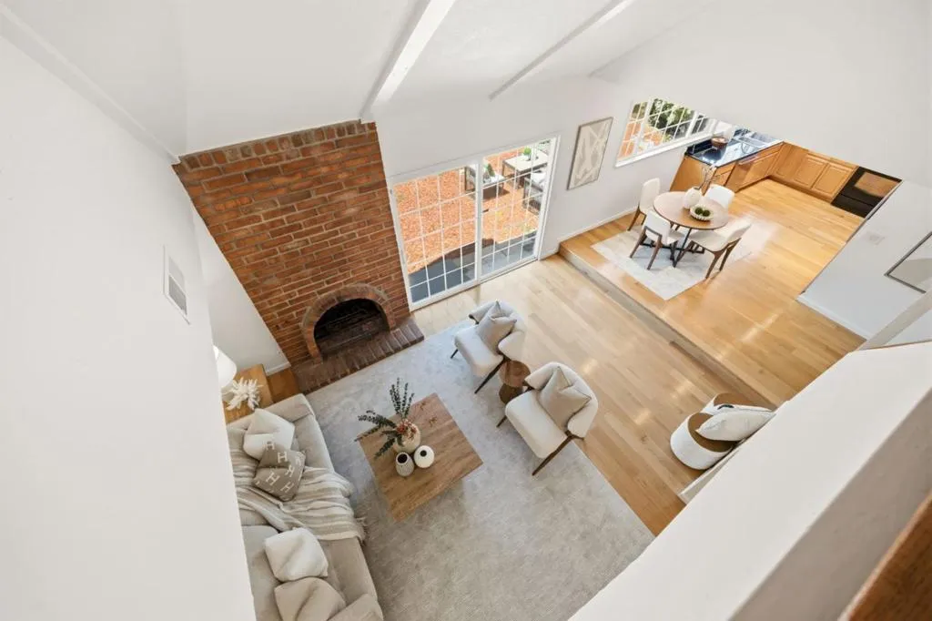 Family room & kitchen view from 2nd story stair landing