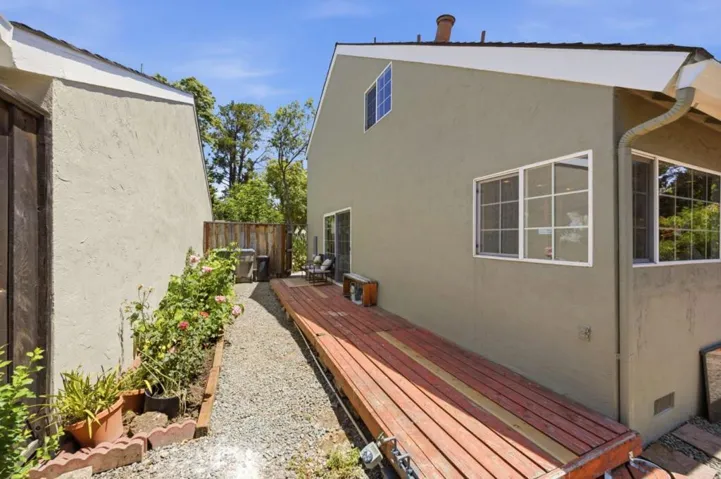 Side yard deck needs to be repaired or replaced.