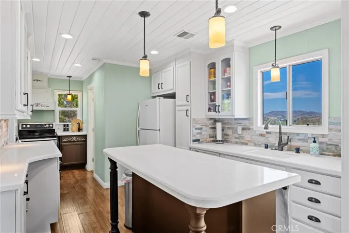 Galley Kitchen with beautiful quartz countertops 
