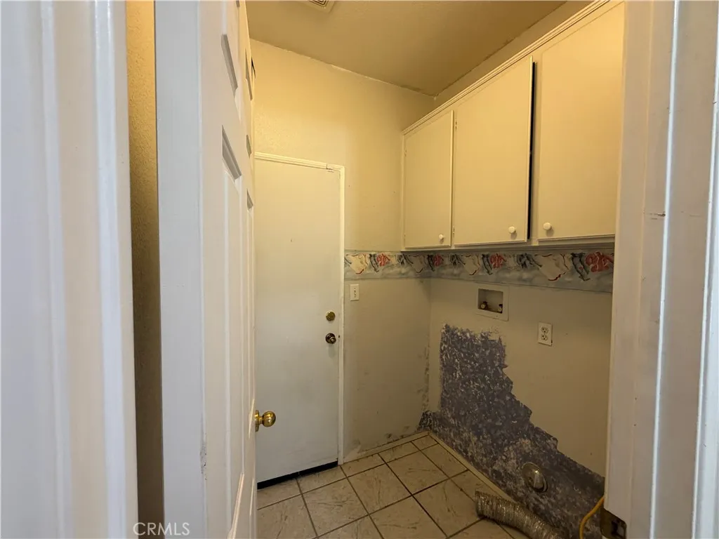 Laundry room by garage