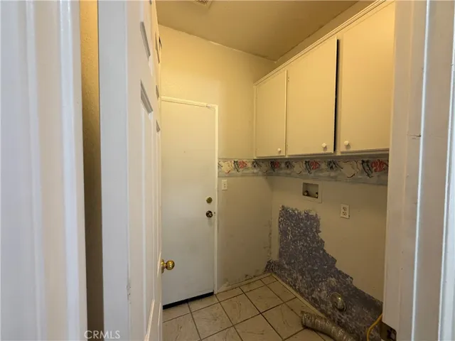 Laundry room by garage