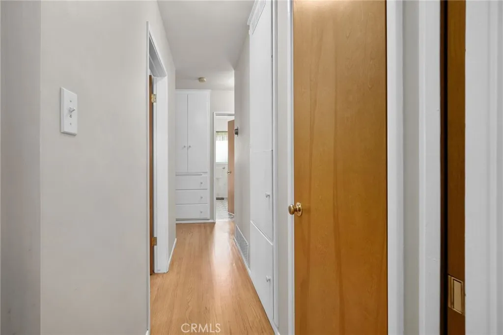 Hallway to Hall Full Bath and two secondary bedrooms