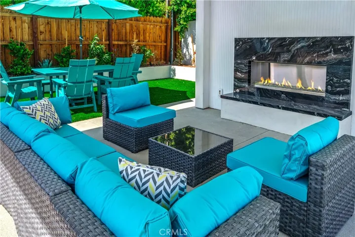 Relax at the picnic area or in the shade of your outdoor living space with Fireplace large screen TV and surround sound.