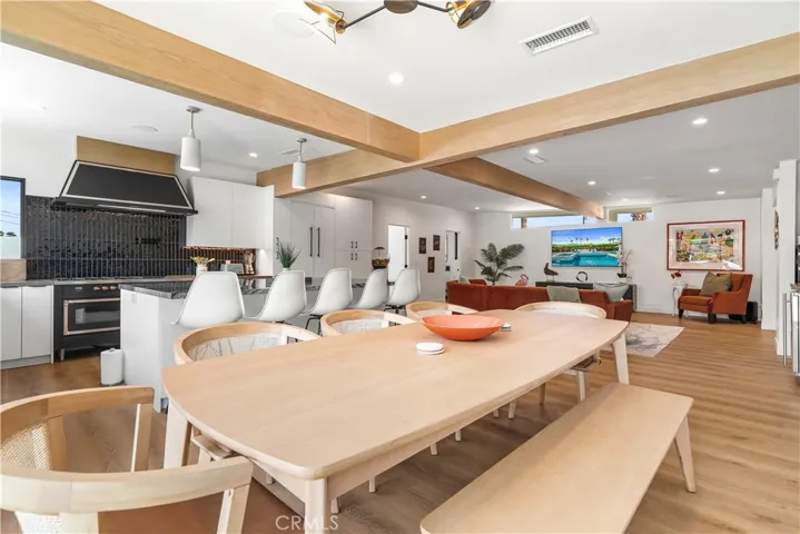 "Classic Palm Springs indoor-outdoor living begins here, with an open great room, exposed beam details, and abundant space for gathering."