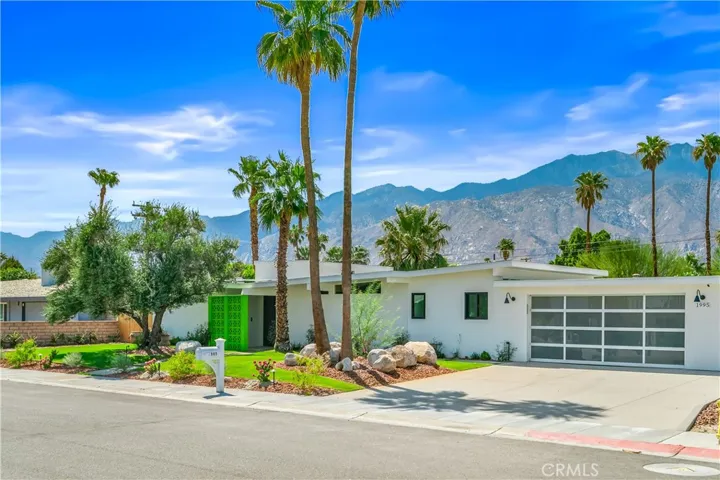 "Extensively remodeled mid-century modern home with stunning mountain views and exceptional curb appeal."