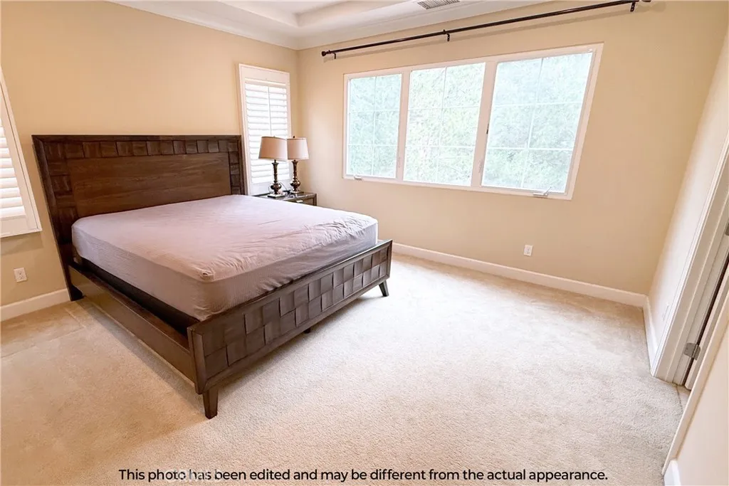Second-floor master bedroom. A queen-size bed is included in the lease at no additional cost.