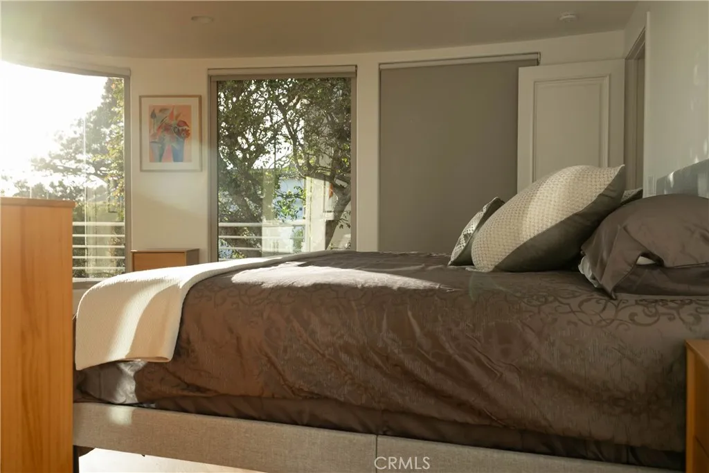 Primary Suite with expansive views and private balcony.
